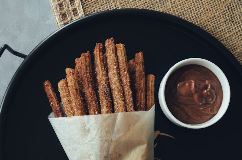 Churro Bites with caramel dip